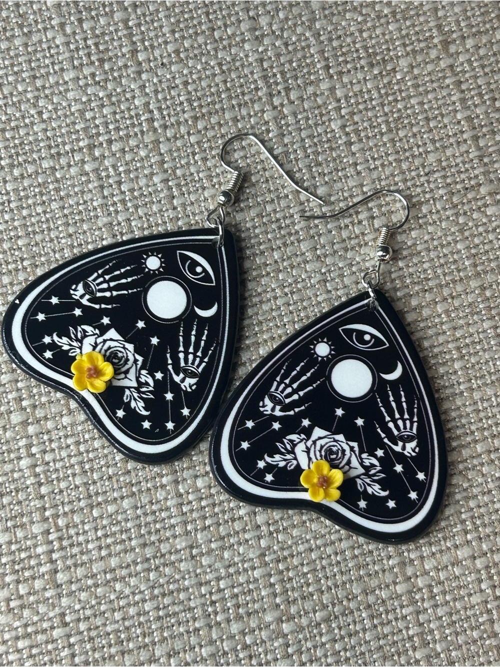 Mystic Black Teardrop Earrings with Yellow Flower Accent